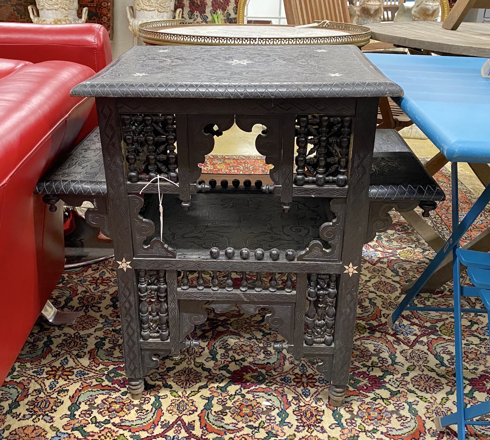 A Moorish ebonised and mother of pearl inlaid occasional table, width 76cm, depth 40cm, height 75cm